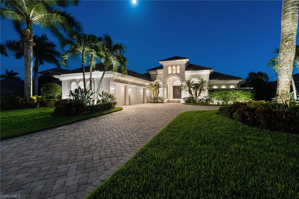 11978 Maidstone Court Naples, FL 34120 - Photo 4 of 44 Front of Home with Garage - Night