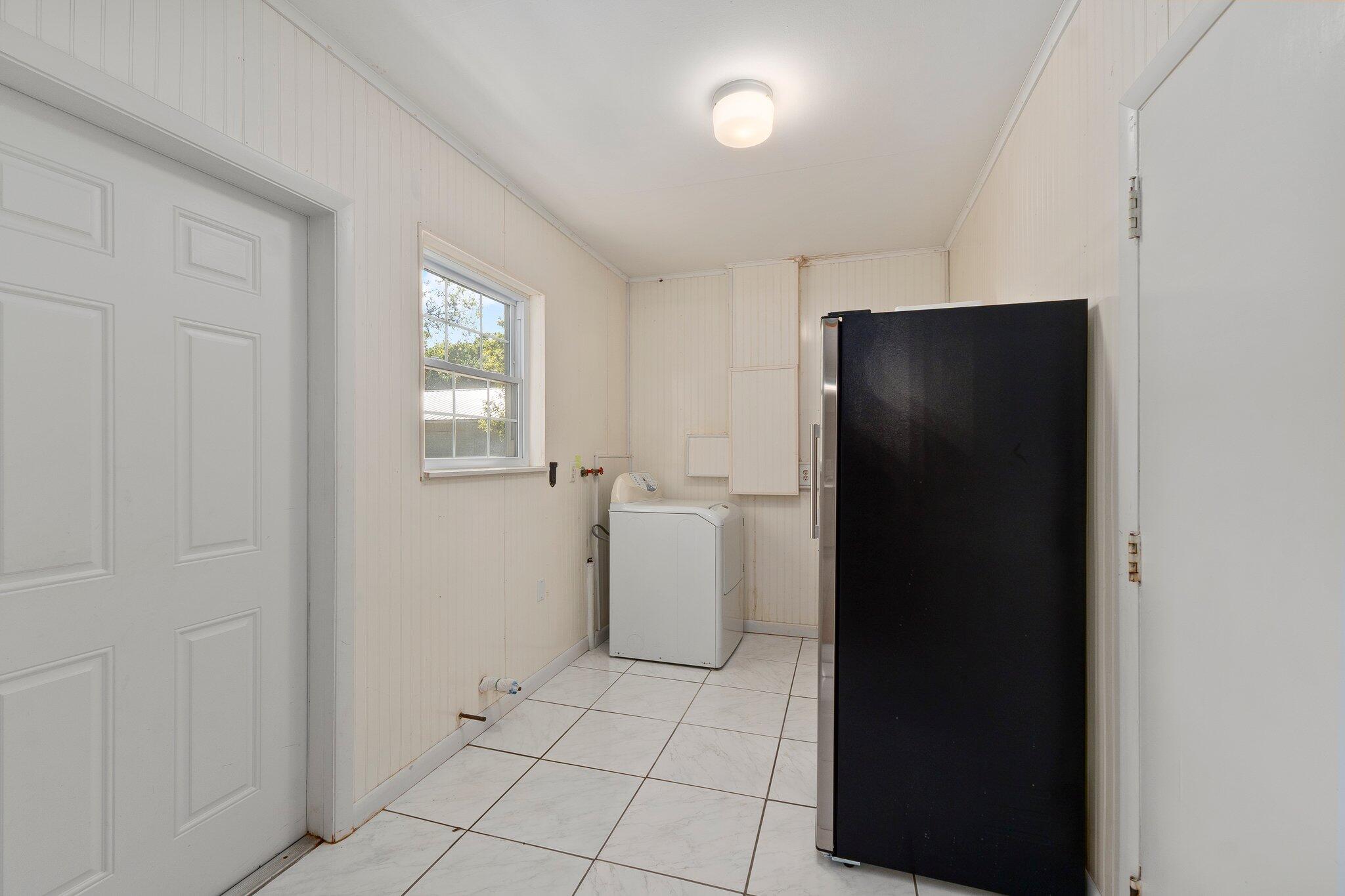 11541 Okeechobee Road Fort Pierce, FL 34945 - Photo 26 of 46 wooden floor in an empty room