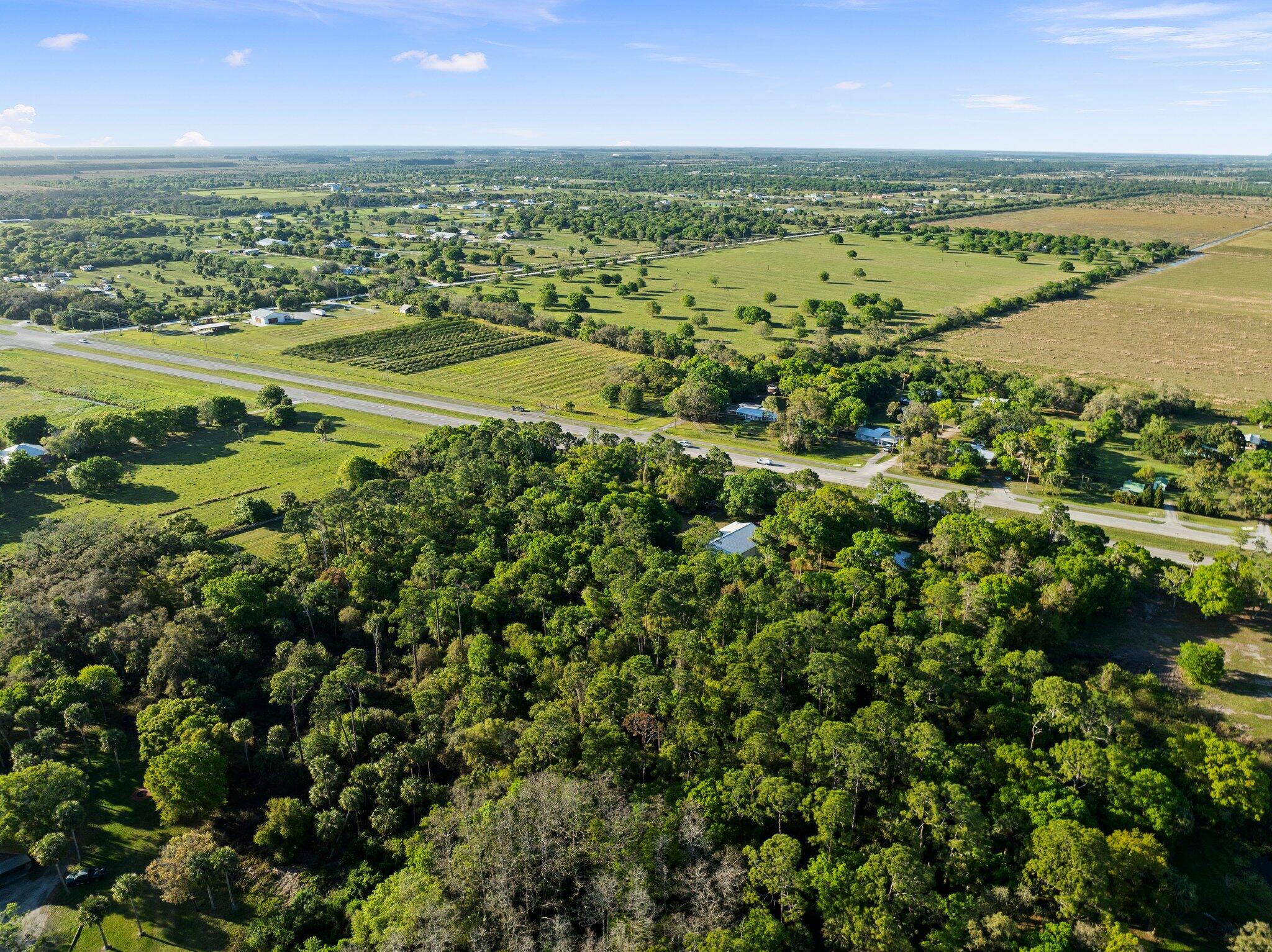 11541 Okeechobee Road Fort Pierce, FL 34945 - Photo 45 of 46 a view of an ocean and city space