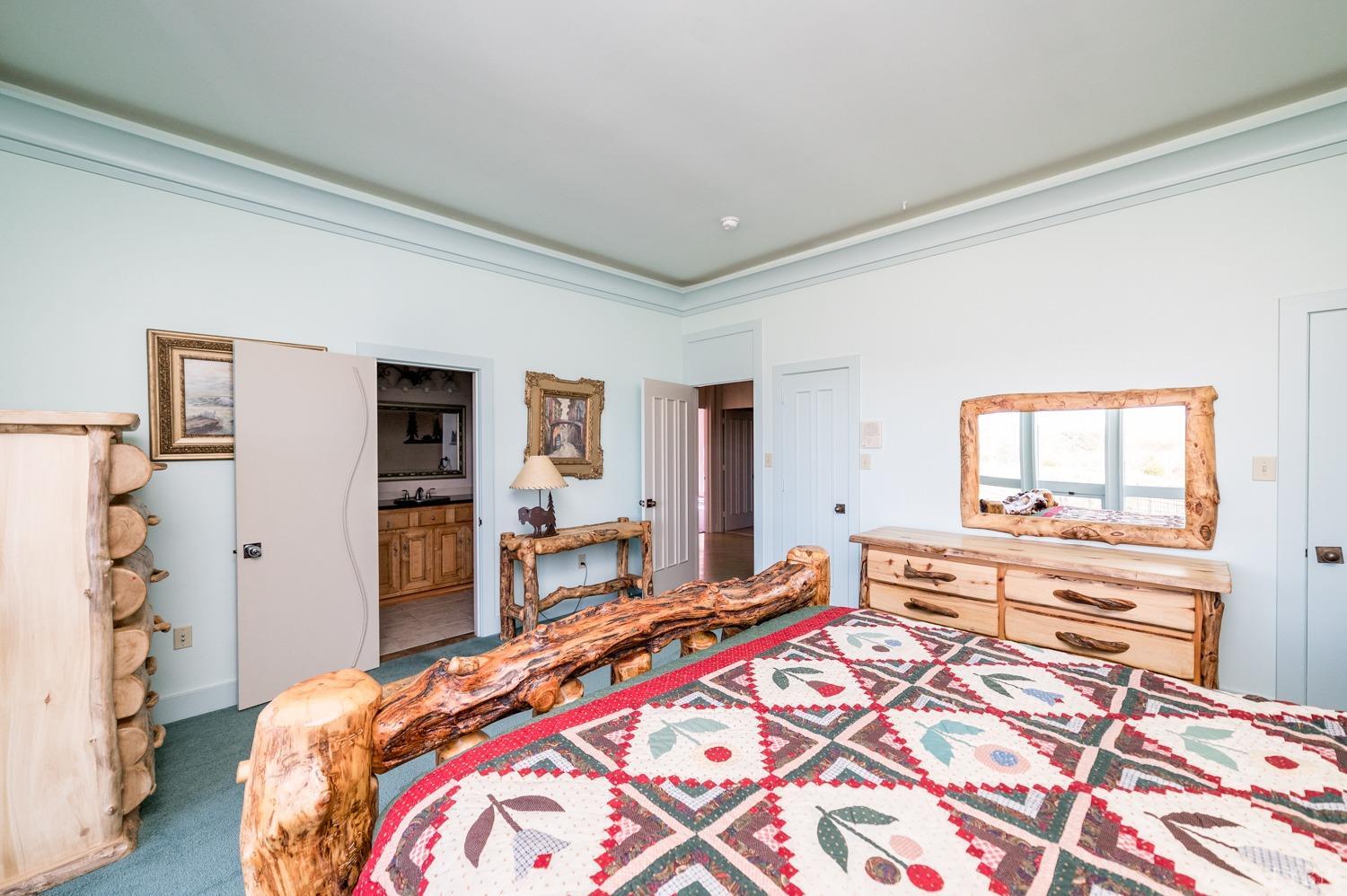 11261 Forest Road Forest, VA 24551 - Photo 62 of 99 a bedroom with a bed and a large mirror on the dresser