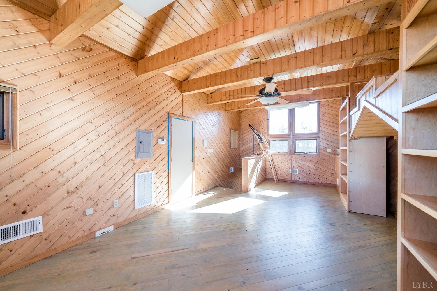 11261 Forest Road Forest, VA 24551 - Photo 72 of 99 a view of an empty room with wooden floor and a window