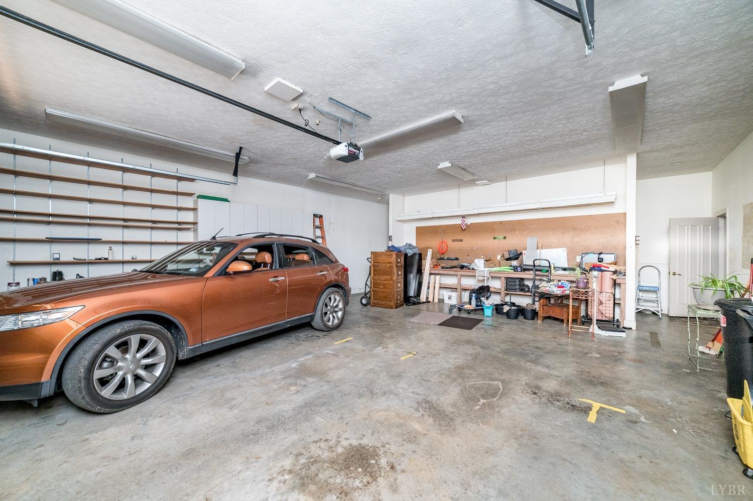 11261 Forest Road Forest, VA 24551 - Photo 73 of 99 a view of a garage and car parked
