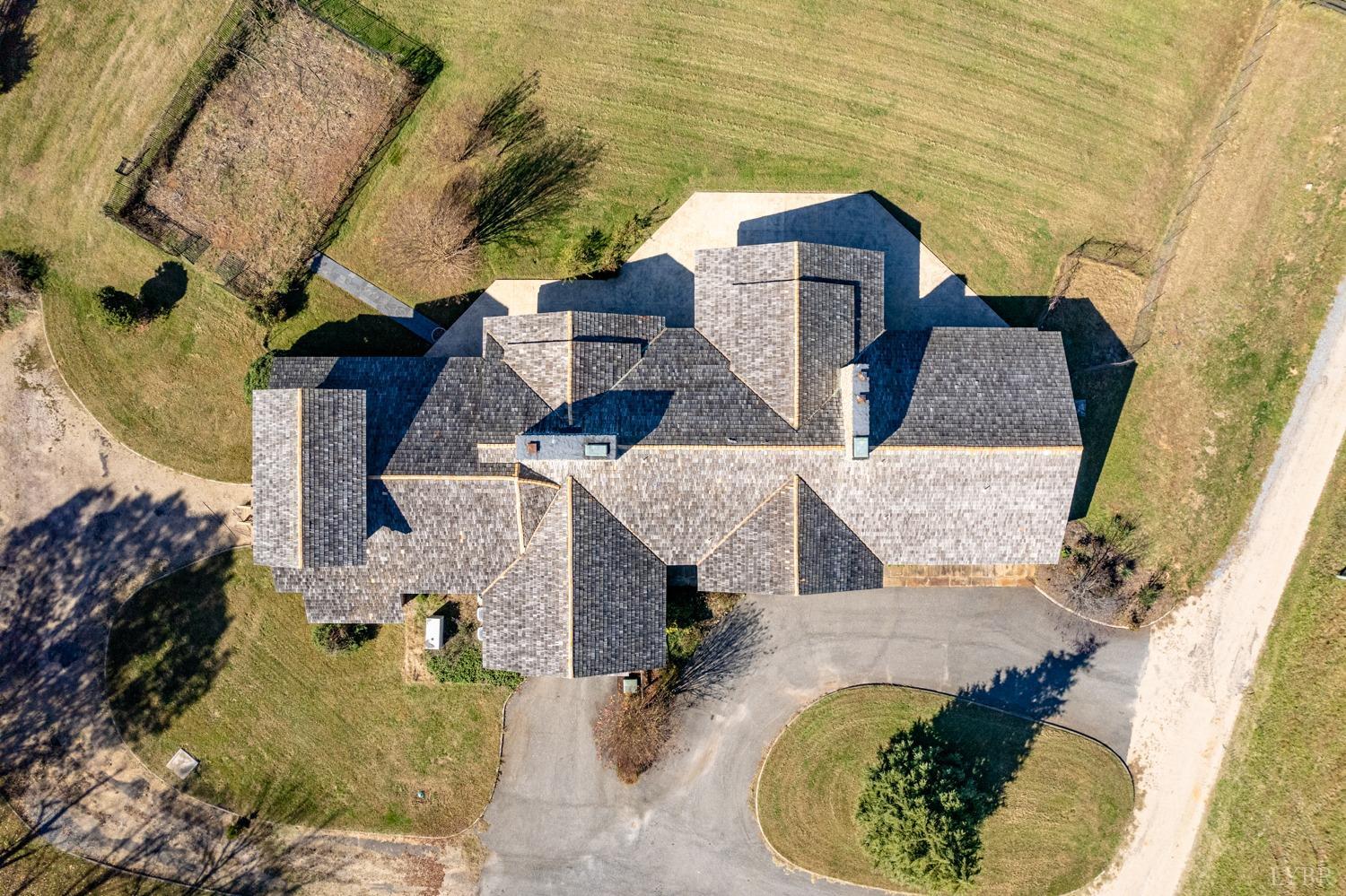 11261 Forest Road Forest, VA 24551 - Photo 10 of 99 an aerial view of a house with a swimming pool