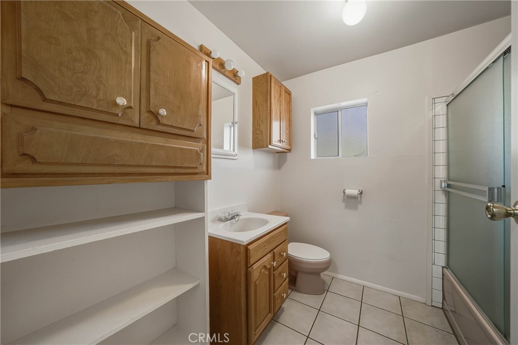 14840 Valley Clearlake, CA 95422 - Photo 12 of 36 a bathroom with a sink a toilet and vanity