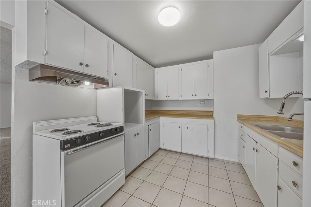 14840 Valley Clearlake, CA 95422 - Photo 16 of 36 a kitchen with cabinets appliances and a sink