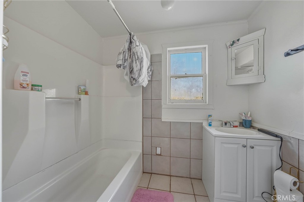 14840 Valley Clearlake, CA 95422 - Photo 23 of 36 a bathroom with a sink toilet and shower