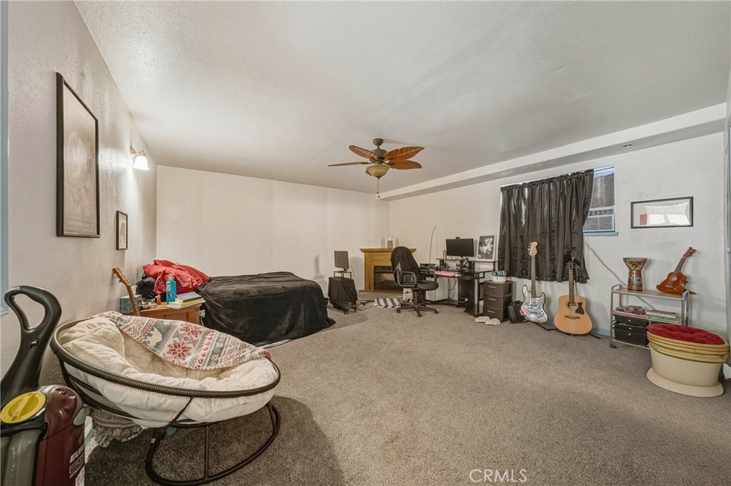 14840 Valley Clearlake, CA 95422 - Photo 26 of 36 a living room with furniture and a mirror