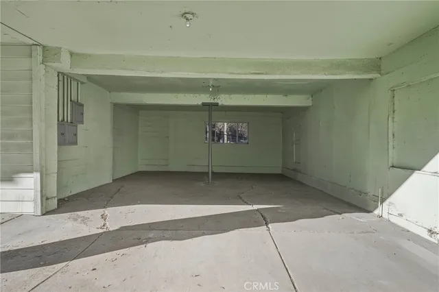a view of roof with wooden floor and fence
