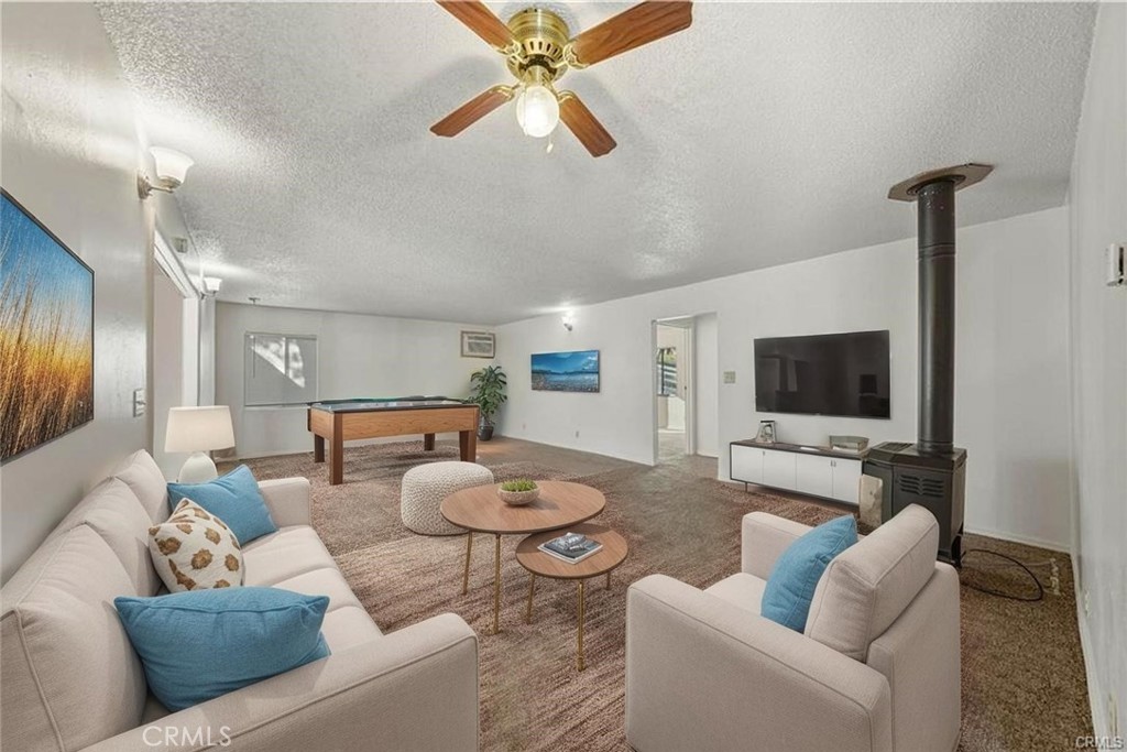 14840 Valley Clearlake, CA 95422 - Photo 9 of 36 a living room with furniture and a flat screen tv