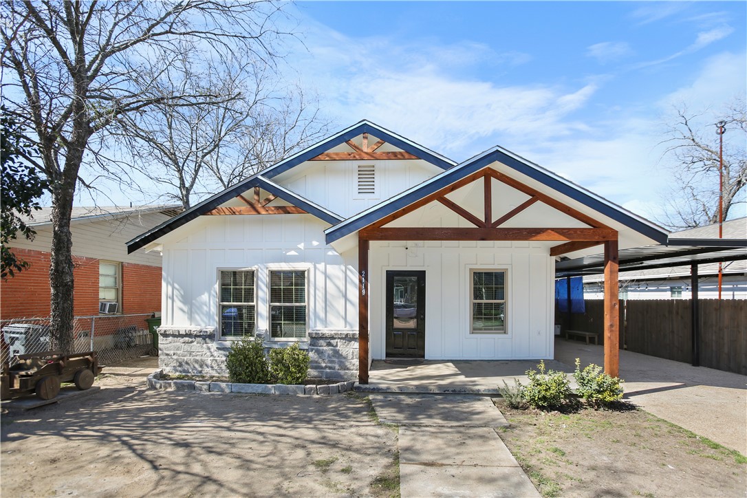 2119 Summer Avenue Waco, TX 76708 - Photo 2 of 32 a front view of a house with garden
