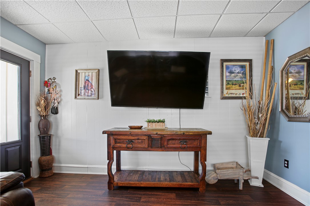 2119 Summer Avenue Waco, TX 76708 - Photo 6 of 32 a living room with furniture and a flat screen tv