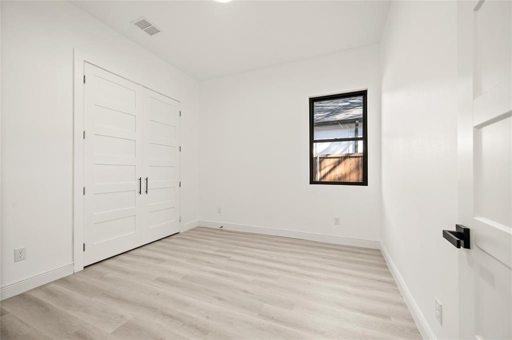 3323 Reed Lane Dallas, TX 75215 - Photo 24 of 33 wooden floor in an empty room