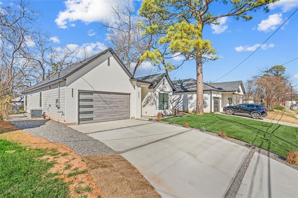 3323 Reed Lane Dallas, TX 75215 - Photo 3 of 33 a view of a house with a yard