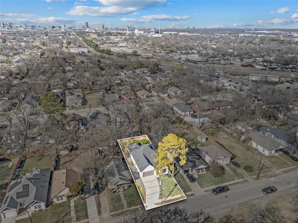 3323 Reed Lane Dallas, TX 75215 - Photo 4 of 33 an aerial view of a house with a mountain
