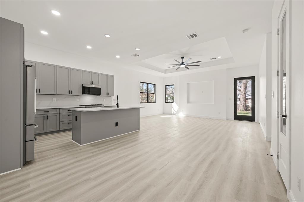 3323 Reed Lane Dallas, TX 75215 - Photo 7 of 33 a view of kitchen with sink microwave and cabinets