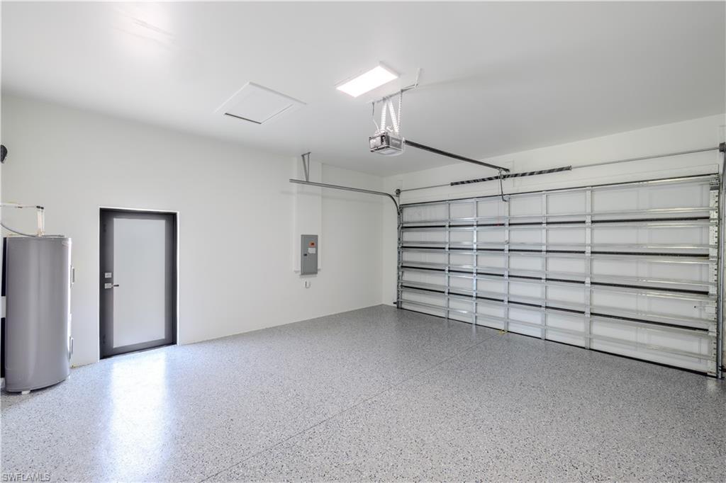 3303 24th Street Southwest Lehigh Acres, FL 33976 - Photo 20 of 25 a view of a garage