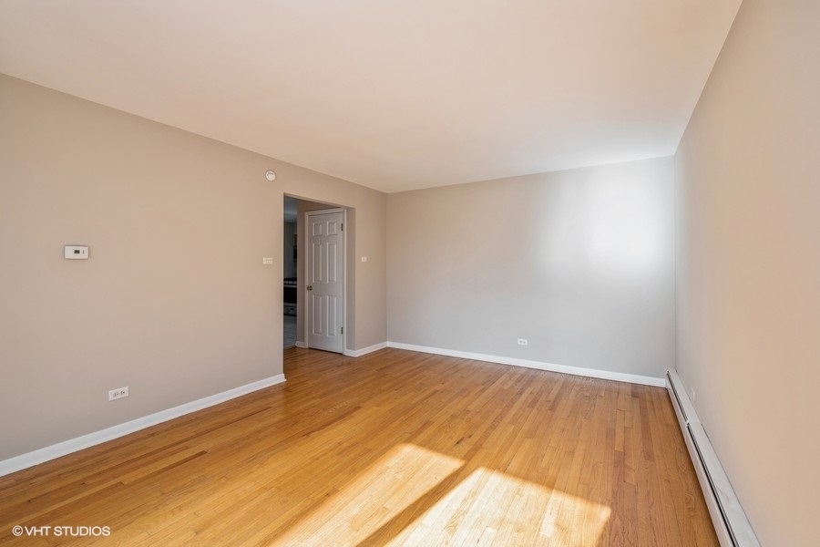 4418 West 55th Street, Unit 5 Chicago, IL 60632 - Photo 4 of 15 a view of an empty room