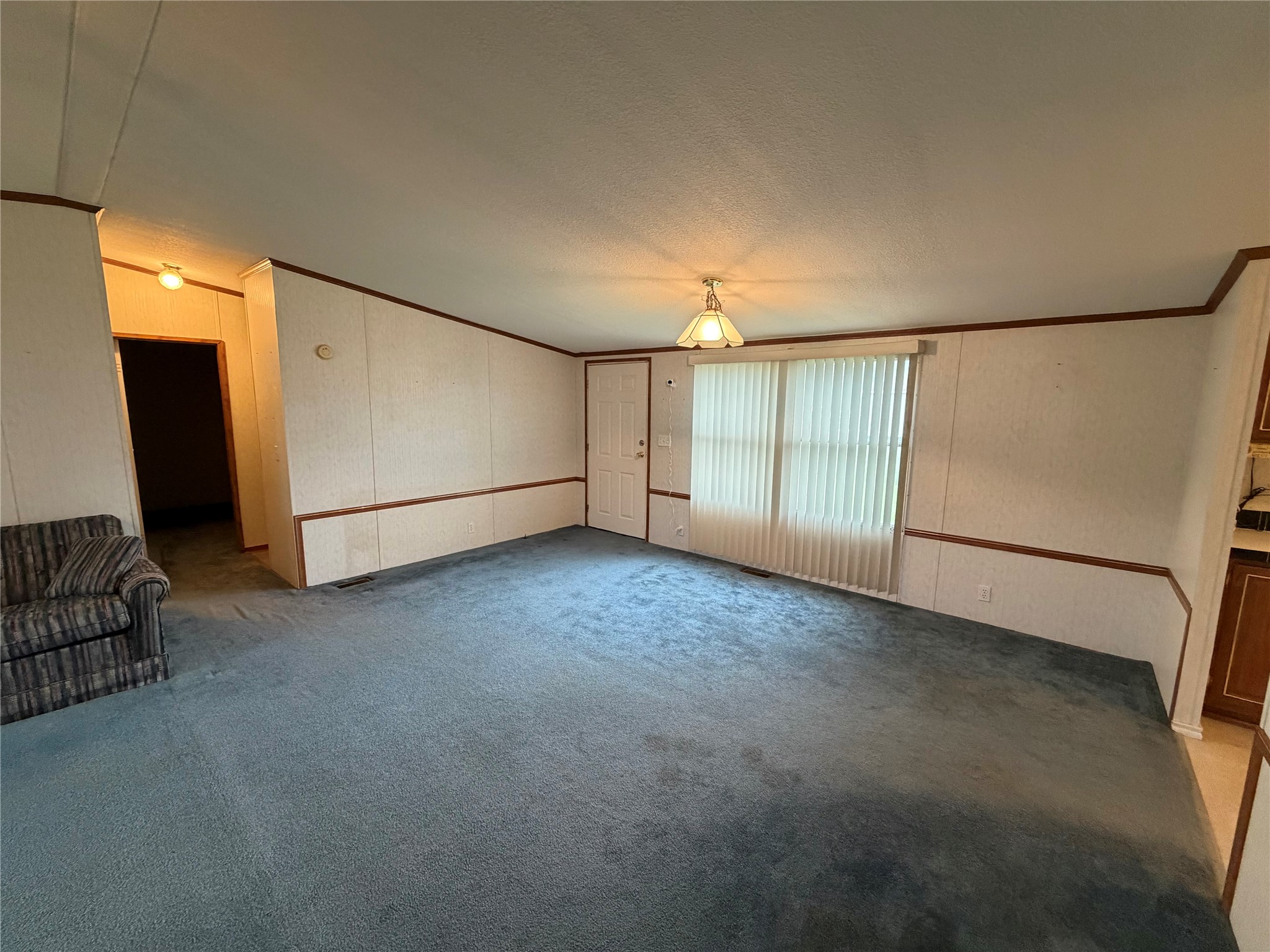 153 Prairie Lea Drive Angleton, TX 77515 - Photo 7 of 30 a view of an empty room with a window
