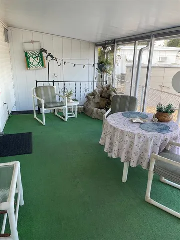 a bed room with furniture and a yard