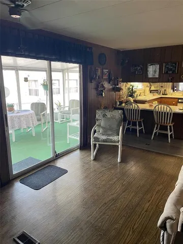 a view of a dining room with furniture window and outside view