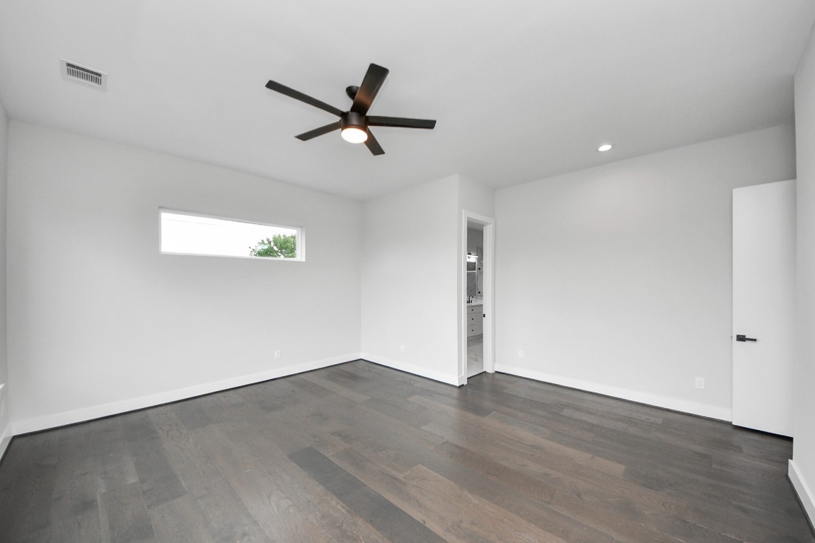 3419 Arlington Street Houston, TX 77018 - Photo 25 of 44 a view of a big room with wooden floor closet and windows