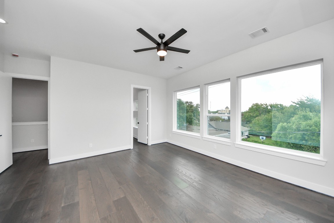 3419 Arlington Street Houston, TX 77018 - Photo 26 of 44 a view of a livingroom with a ceiling fan and window