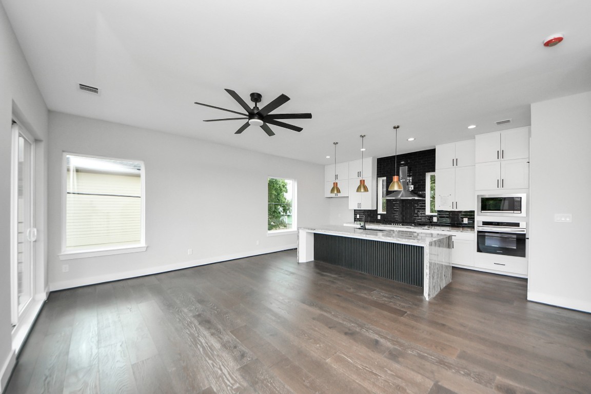 3419 Arlington Street Houston, TX 77018 - Photo 4 of 44 a view of kitchen with sink and wooden floor