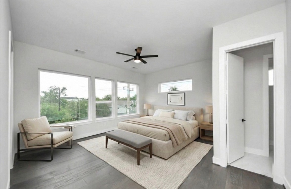 3419 Arlington Street Houston, TX 77018 - Photo 5 of 44 a bedroom with a bed and a couch