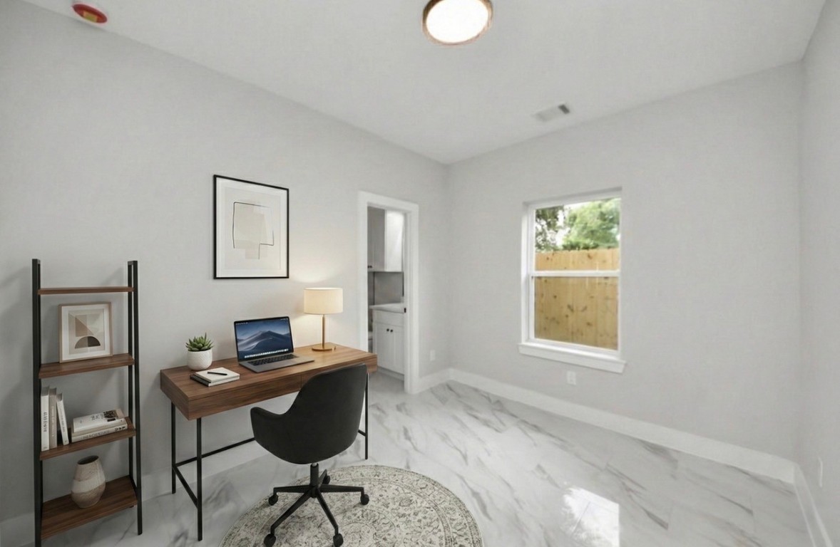 3419 Arlington Street Houston, TX 77018 - Photo 8 of 44 a workspace with furniture and window