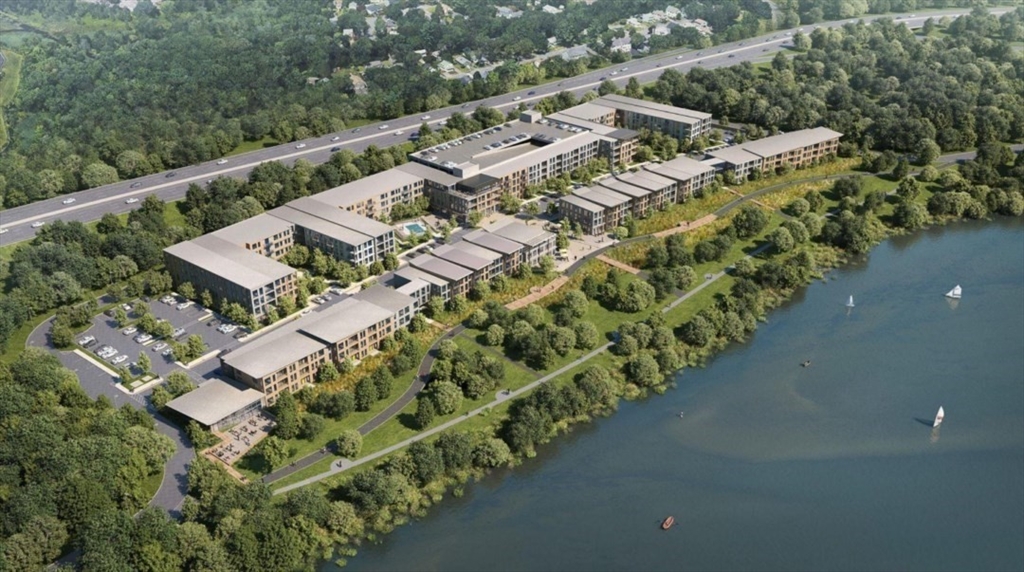 200 Quannapowitt Parkway, Unit 3121 Wakefield, MA 01880 - Photo 4 of 12 an aerial view of a house with a yard