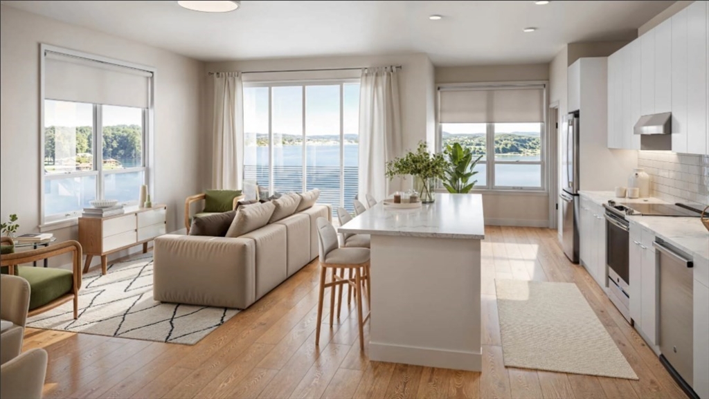 200 Quannapowitt Parkway, Unit 3121 Wakefield, MA 01880 - Photo 8 of 12 a living room with furniture and a large window