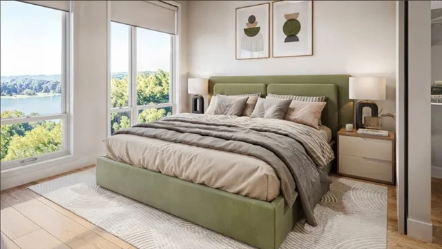 a roof deck with table and chairs