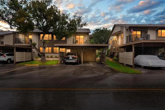 a car parked in front of a house