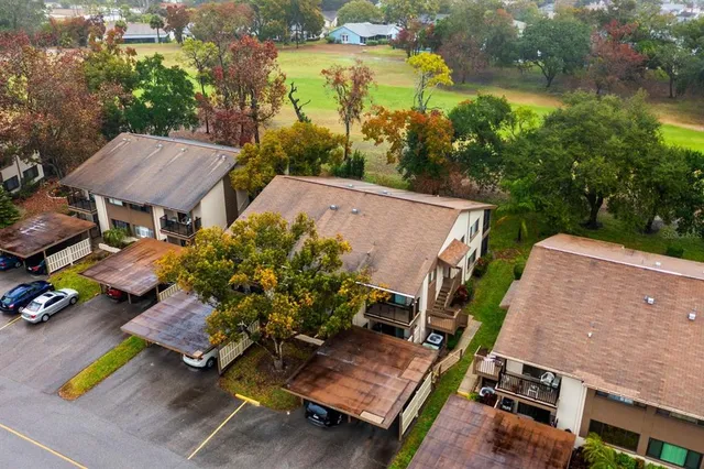 an aerial view of a house with a garden