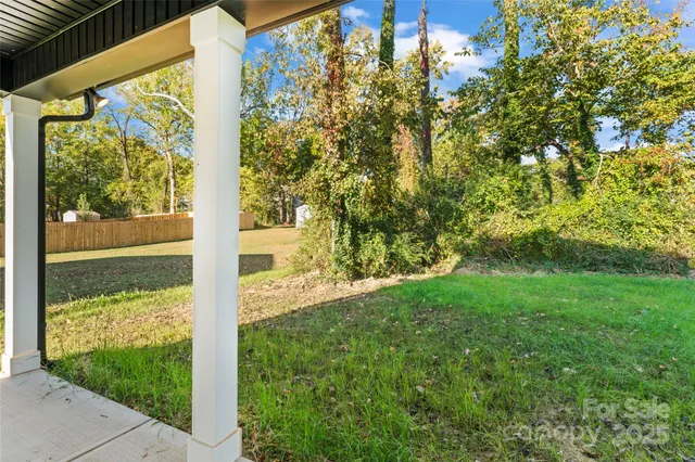a view of a porch with a yard