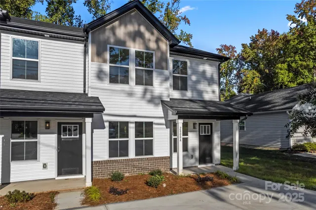 front view of a house with a yard