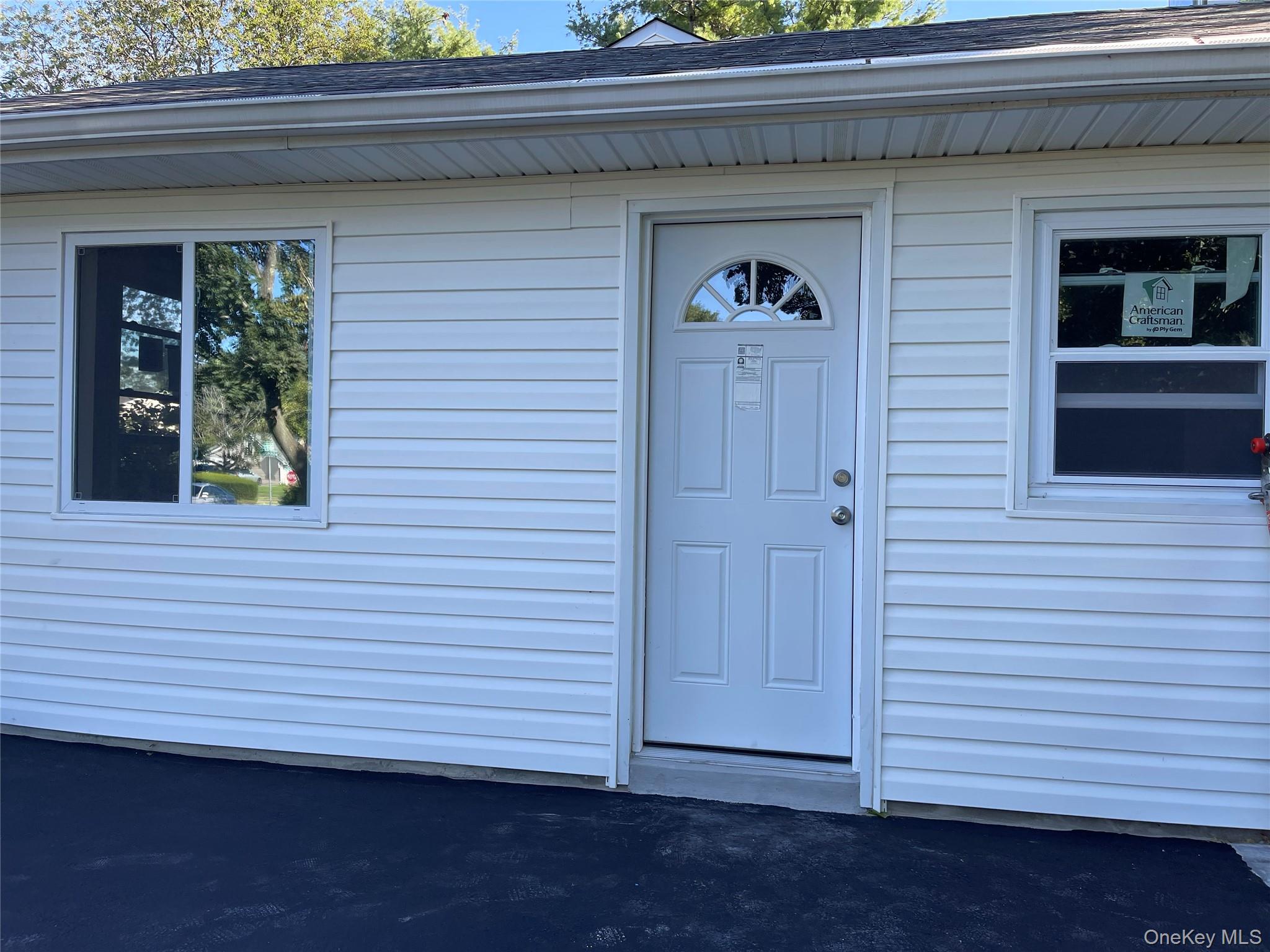 a view of front door and porch