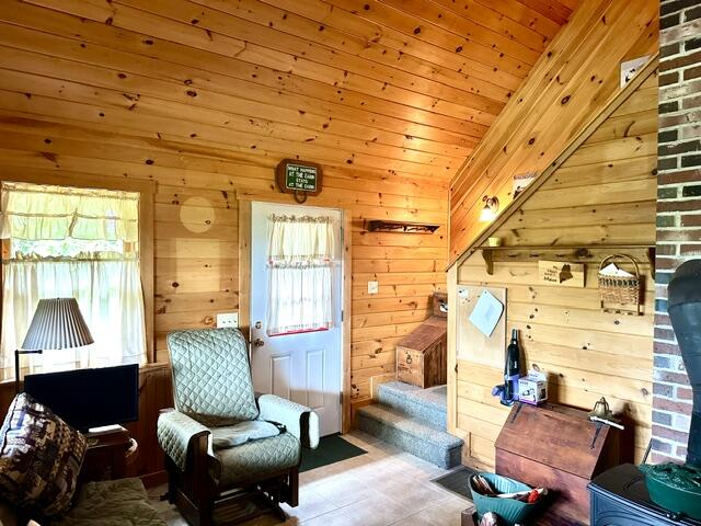 156 Hussey Road Parsonsfield, ME 04047 - Photo 3 of 25 3. Livingroom - Entry and Stairs 2