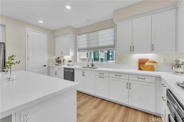 a view of a dining room with furniture and a wooden floor
