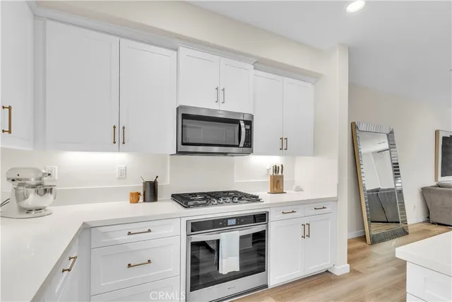 a bedroom with a large bed and a large window