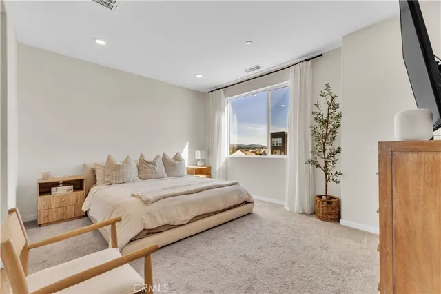 a bathroom with a bathtub and a sink