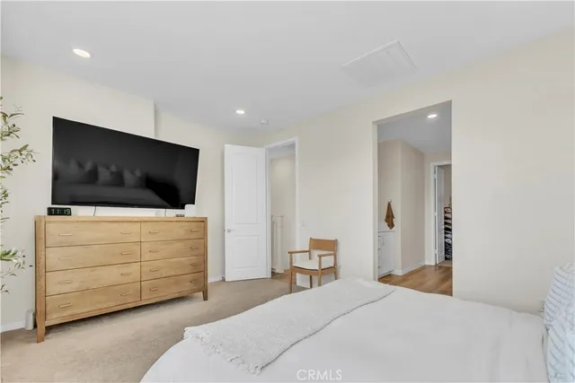 a en suite bathroom with a sink and mirror