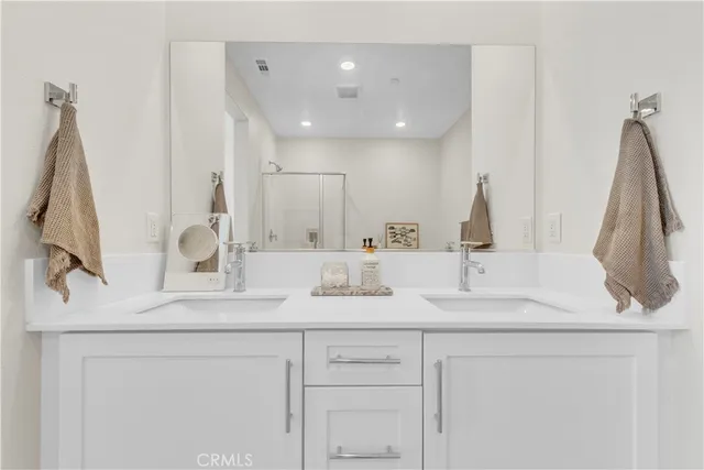 a bedroom with a bed and a walk in closet