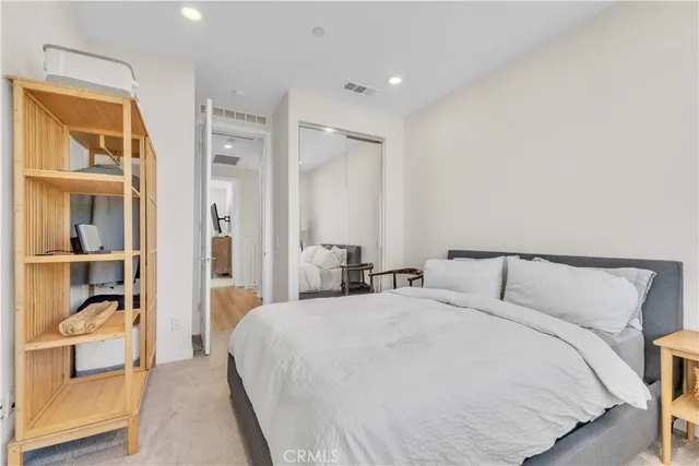 a room with furniture and flat screen tv