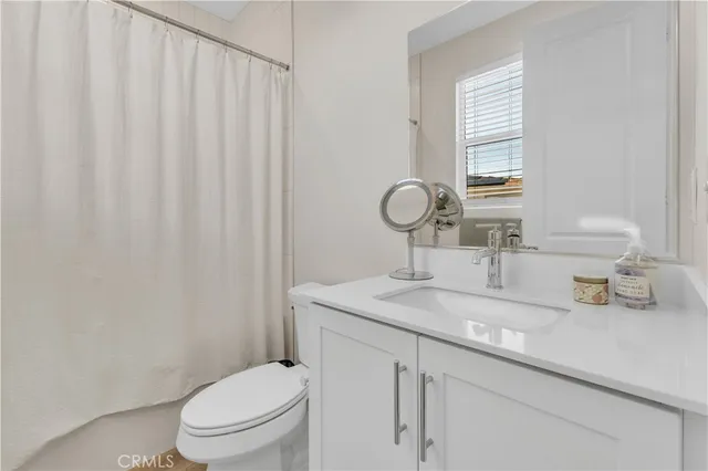a view of a balcony with chairs