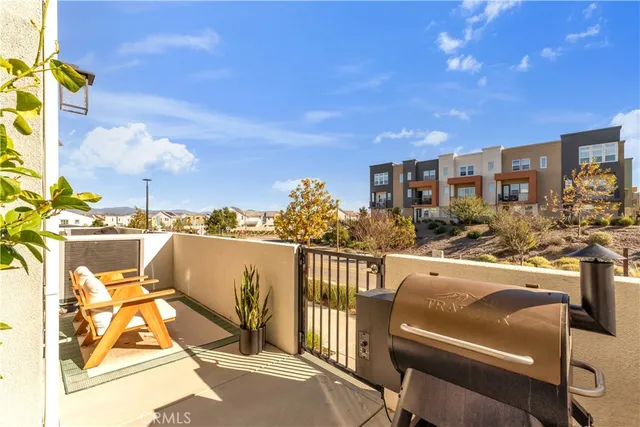a view of a swimming pool with a lounge chair