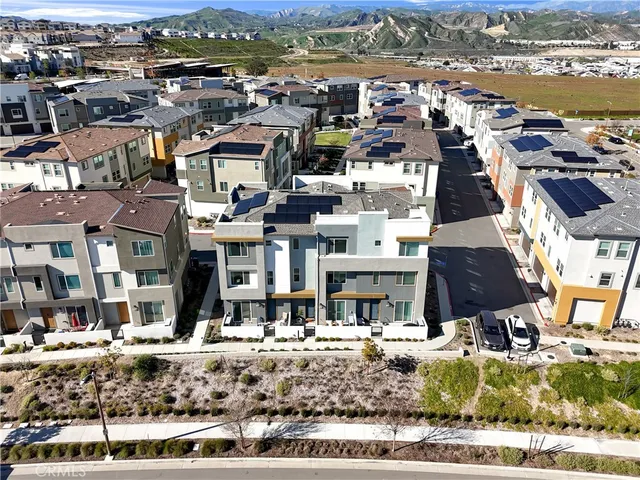 an aerial view of a city with lots of residential buildings