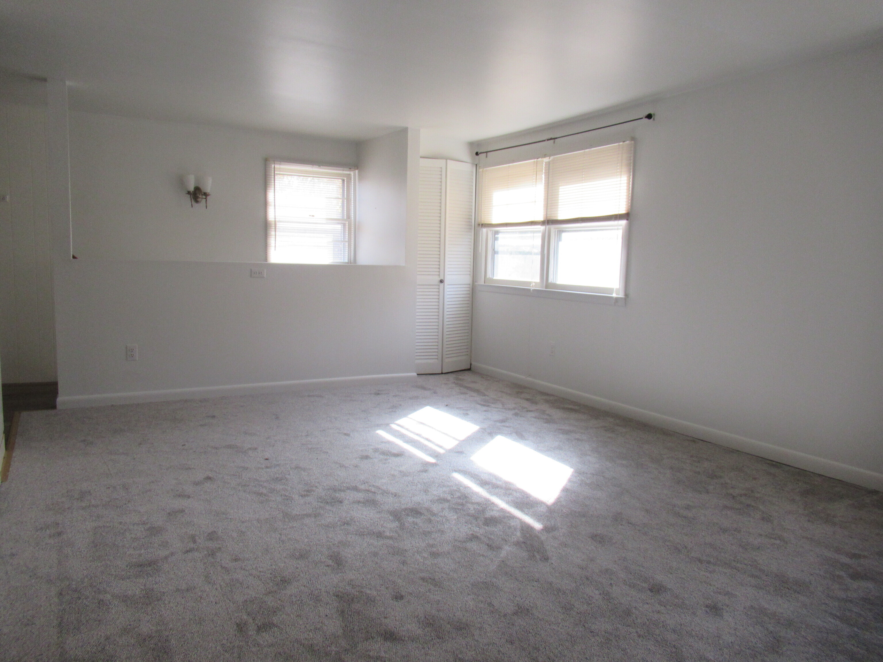 255 Fairfield Woods Road Fairfield, CT 06825 - Photo 3 of 22 an empty room that has a window