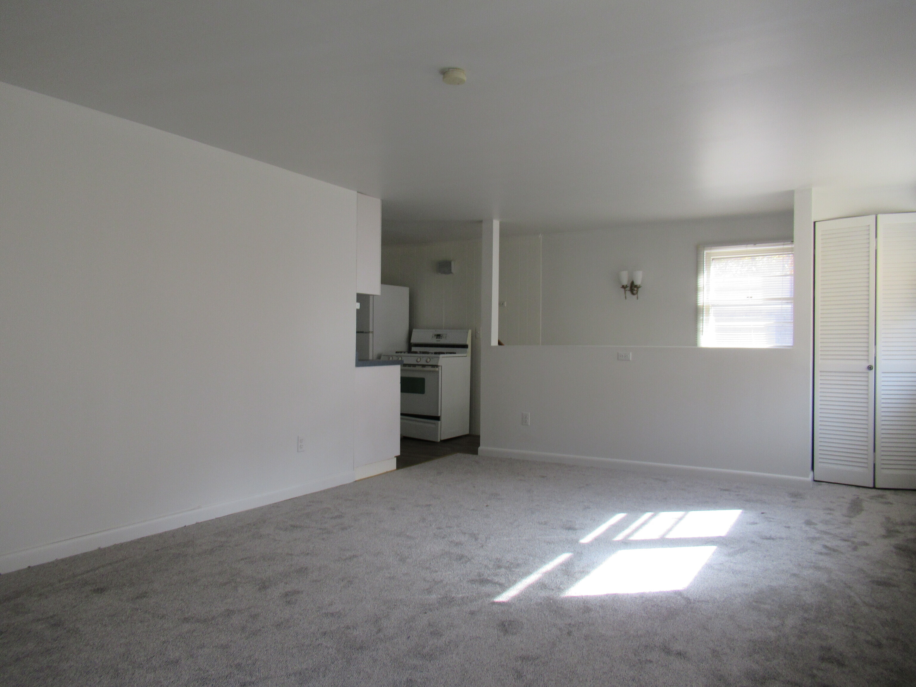 255 Fairfield Woods Road Fairfield, CT 06825 - Photo 10 of 22 an empty room with windows