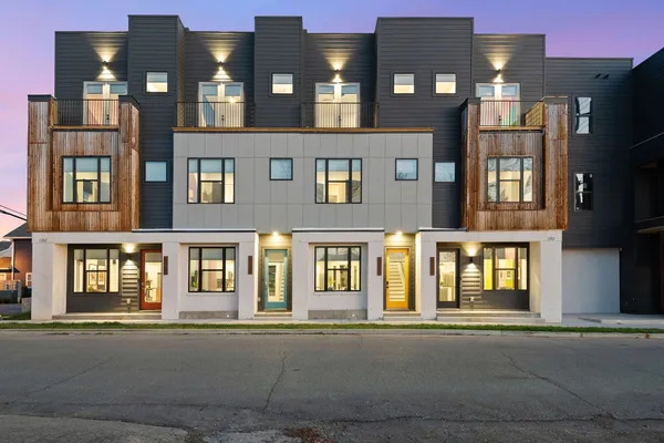 a front view of a multi story residential apartment building